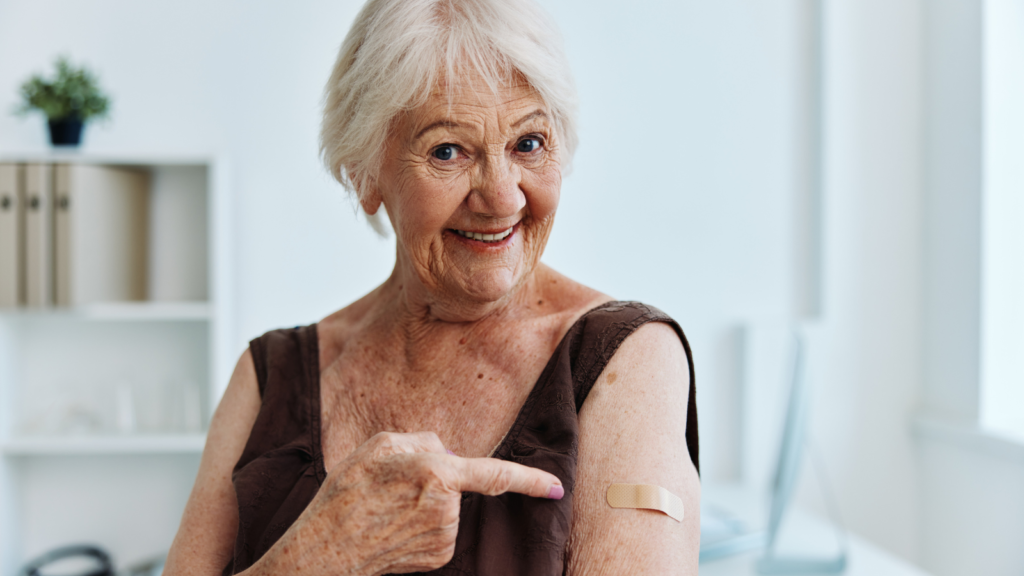 Senior who has just had a flu shot